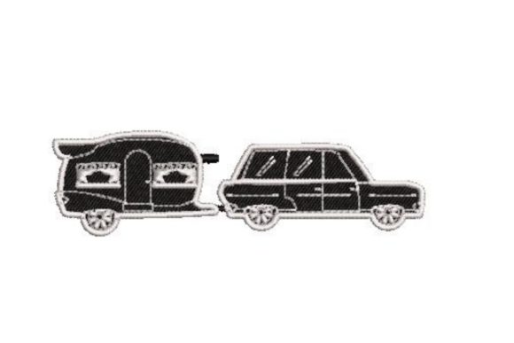 Vintage Camping Trailer Being Towed